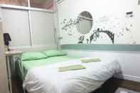 ห้องนอน Kamin Bird Hostel