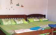 Kamar Tidur 6 Friendly Guesthouse