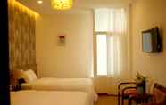 Phòng ngủ 4 Flora Hotel Hue