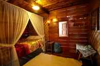 Bedroom Rumah Gadang Natigo "A Home to Stay with Tradition"