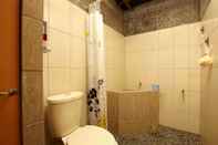 In-room Bathroom Rumah Gadang Natigo "A Home to Stay with Tradition"