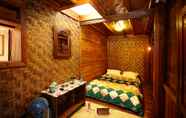 Bedroom 4 Rumah Gadang Natigo "A Home to Stay with Tradition"