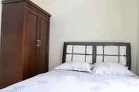 Bedroom Elegant Room at Dessy Guest House (DJ1)