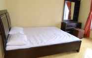 Kamar Tidur 6 Yasmin Guesthouse Bukittinggi