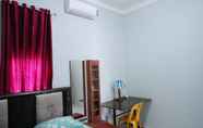 Bedroom 6 Comfy Room near Minangkabau International Airport (EBY)