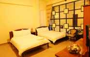 Phòng ngủ 4 Quang Chien Hotel