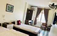 Phòng ngủ 6 Huong Giang Hotel