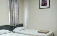 Kamar Tidur 7 Amrise Hotel