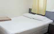 Kamar Tidur 6 Amrise Hotel