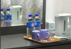 卧室 4 Amrise Hotel