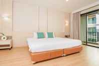 Kamar Tidur Mike Garden Resort Hotel