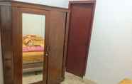 Kamar Tidur 4 Manik Homestay