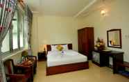 Kamar Tidur 3 Chau Loan Hotel