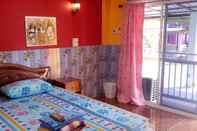 ห้องนอน Rueng Sri Siri Guesthouse