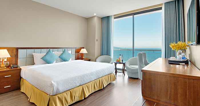 Phòng ngủ Yarra Ocean Suites Danang