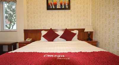 ห้องนอน 4 Omega Hotel
