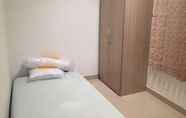 ห้องนอน 4 Single Room at Gading Elok Timur near MKG Mall (KG2)