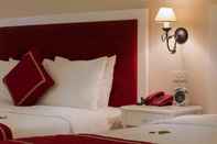 Bedroom Calypso Premier Hotel