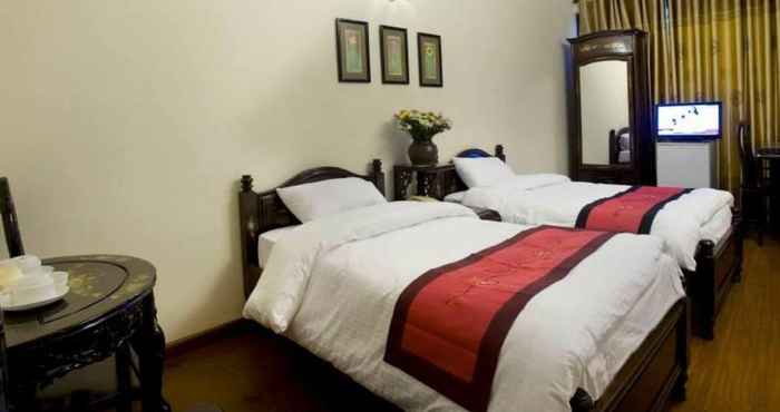 Kamar Tidur Thang Long 1 Hotel