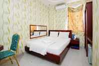Phòng ngủ Lucky Star Tan Dinh Hotel