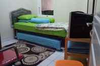 ห้องนอน Cozy Room at Anggrekloka near Teras Kota Mall (AGK)