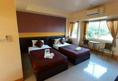 Bedroom 4 Winhouse Hotel