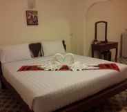 Bedroom 4 Huen Kuang Nan Hotel