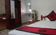 Bedroom 3 Red Ceramics Homestay