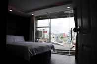 Kamar Tidur Snow Garden Hotel