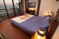 Kamar Tidur Nui Bay Sunset Villa 10