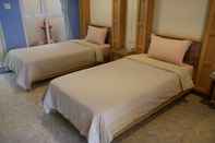 Bedroom Ploy Resort Nang Rong