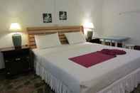 Phòng ngủ C & C Resort Buriram