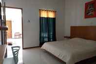 Phòng ngủ Hotel Pondok Hexa Seaside