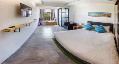 Kamar Tidur 4 Roomies Suites Boutique Hotel