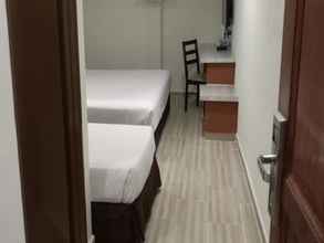 Kamar Tidur 4 Station Budget Hotel