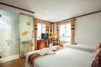 Bedroom May De Ville Legend Hotel