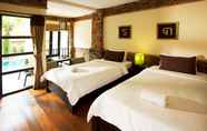 Kamar Tidur 7 Motive Cottage Resort