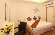 Kamar Tidur 4 White Cat Hotel