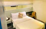 Kamar Tidur 2 Hometown Hotel Lacson Bacolod