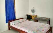 ห้องนอน 4 Value Room in Pantai Kukup at Winahyu Resorts