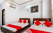 Kamar Tidur 4 Tuan Long Hotel