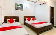 Kamar Tidur 6 Tuan Long Hotel