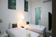 Kamar Tidur The Tree Boutique Hotel