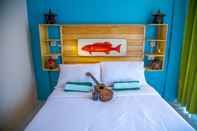 Phòng ngủ Flotsam and Jetsam Artist Beach Hostel