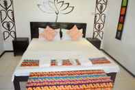 Kamar Tidur Peace and Love Beach Club