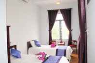 Bilik Tidur Purple Garden Homestay