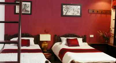 Bilik Tidur 4 Zodiac Boutique Hotel