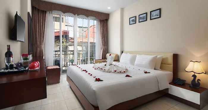 Kamar Tidur Dream Central Hotel