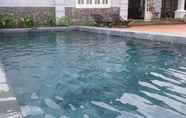 Kolam Renang 6 GingerGrass Homestay