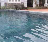 Kolam Renang 6 GingerGrass Homestay